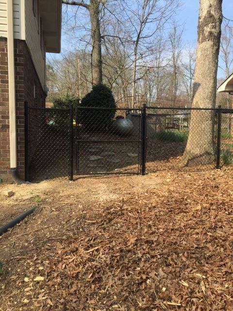 Cedar wood privacy fence installation